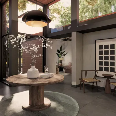 A render of the vestibule for the 'Kasu Vaha' villa project. The double-height space with floor-to-ceiling windows is designed to welcome the outdoors in, with a sculptural wooden table anchoring the entryway.