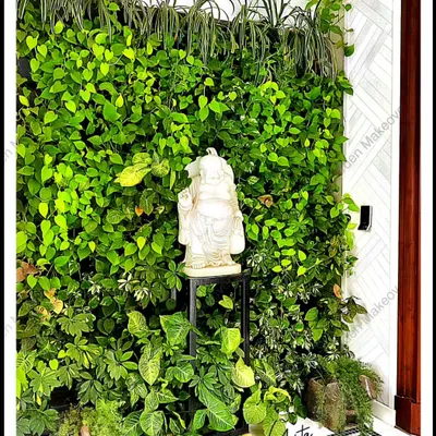 This is one of my favorite living wall installations. The variety of real plants with different leaf shapes and shades of green creates a rich, organic tapestry that brings a sense of calm and natural beauty indoors.