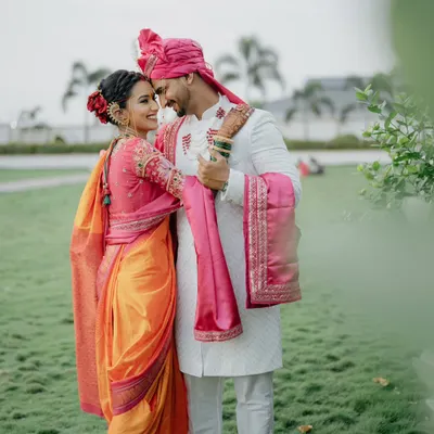 A beautiful portrait of a couple in traditional Maharashtrian attire. The way they look at each other speaks volumes about their love.
