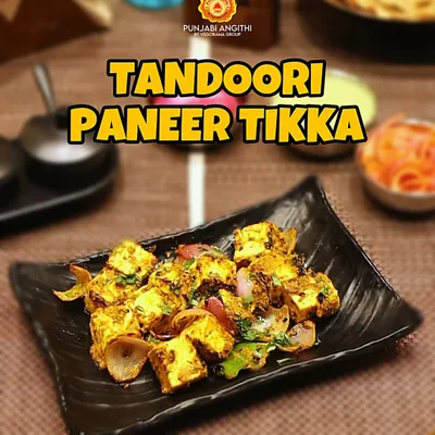 My Tandoori Paneer Tikka is a classic for a reason. Soft cubes of paneer marinated and grilled with onions and bell peppers for that perfect smoky flavor.