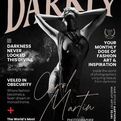 This black and white shot for Darkly Magazine is a study in form. I used a single, hard light source to carve the model's body out of the darkness, creating a living sculpture.