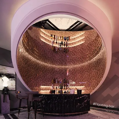 A direct view of the floating home bar concept, highlighting the textured interior, tiered bottle display, and elegant black marble counter.