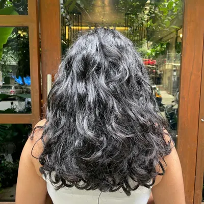 Before: This client's hair is ready for a pop of color to match her personality.