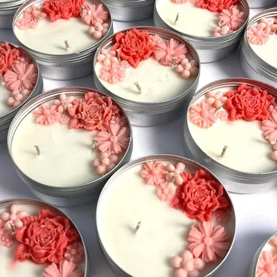 This week's top picks are lighting up hearts! This image shows a bulk order of my floral tin candles, a popular choice for return favors.