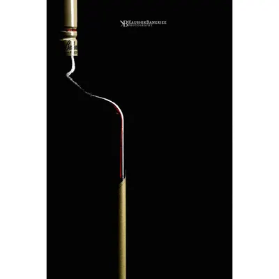 An abstract and minimalist take on a wine bottle. I used rim lighting to trace the elegant curve of the bottle against a pure black background, turning a simple product into a piece of art.
