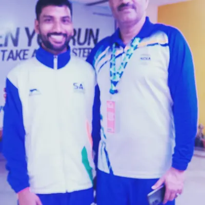 My connections in the athletics community help provide the best opportunities for my students. Here I am with an official, discussing the future of our sport.