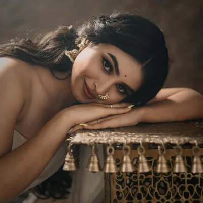 A serene and beautiful shot from a creative photoshoot. I created a soft, glowing makeup look with a defined eye to achieve this timeless, classic portrait.