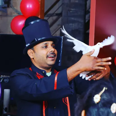 The magical appearance of a live dove is a beautiful and surprising moment in my show. This is a classic illusion that always leaves the audience in awe.
