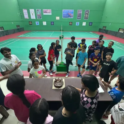 Celebrating World Badminton Day with a cake on the court. It’s a day to celebrate the sport we love with the people who make our academy special.