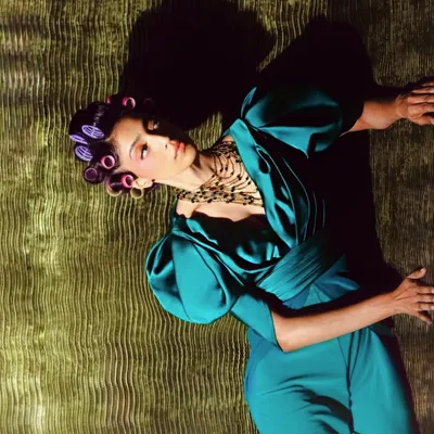 A retro-inspired look for a fashion editorial. I used a vibrant pink eyeshadow and styled the hair in rollers to create a fun, vintage vibe.