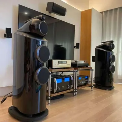 An audiophile's dream setup featuring flagship Bowers & Wilkins floor-standing speakers. We provide and install high-end audio components for unparalleled sound fidelity in your living room or dedicated theater.