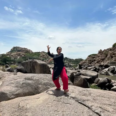 On a solo trip to Hampi, surrounded by the beauty of its ancient temples and rocky landscapes. I just couldn't help but strike a dance pose. The land itself felt like it was filled with rhythm and stories.