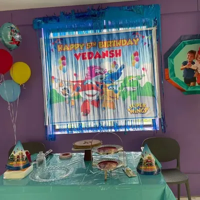 Getting the party started for Vedansh's 5th birthday with a vibrant Super Wings theme. We set up the backdrop and decorations to create an immersive experience from the moment guests arrive.