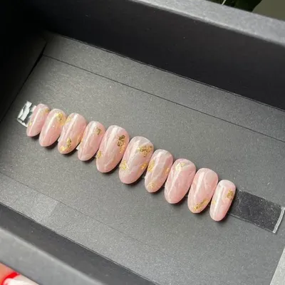 Inspired by nature, this beautiful set mimics the look of rose quartz with delicate gold foil accents. It's a perfect example of a subtle yet artistic design.