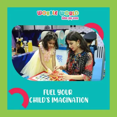 A mother and daughter work on a creative building game together. We offer a variety of activities that fuel your child's imagination.