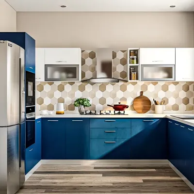 A modern U-shaped kitchen I designed with bold blue base cabinets and white overhead units. The hexagonal tile backsplash adds a graphic element, and the layout provides an efficient workflow.