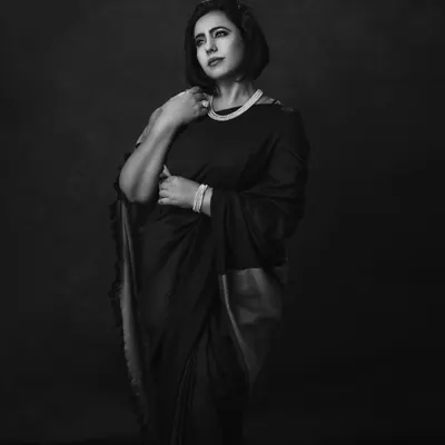 In the drape of a saree, she carries her heritage. This black and white portrait is a modern take on traditional wear, full of grace and strength.