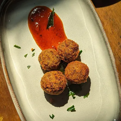 In Kerala, we make cutlets out of everything, but my heart belongs to beef cutlets. Crispy on the outside and tender on the inside, they are a must-have appetizer for any event. I serve them with my special homemade ketchup.