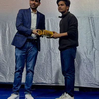A proud moment receiving an award from Shri Mohan Singh Meena at a cultural program for my contributions. Recognition for my art always motivates me to work harder.