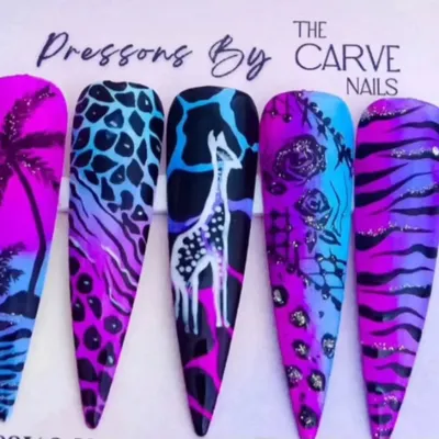 Entry number 7 from one of our nail art giveaways. The creativity in this animal print and floral combination is outstanding.