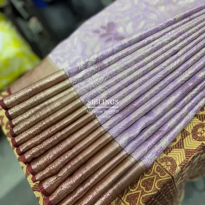Mastering the art of fluffy pleats in our workshop. Each pleat is carefully crafted and ironed to perfection.