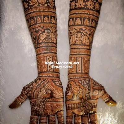 This full-arm bridal design, featuring traditional figures, was a proud moment for my team and me. The fine lines and flawless finishing show the dedication we bring to every large wedding order.