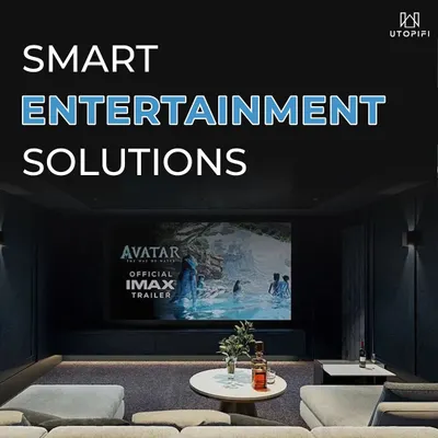 We provide complete smart entertainment solutions that transform your living room into a state-of-the-art home theater. This image, featuring a large projection screen, showcases the kind of immersive viewing experience we design for our clients.