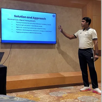 Presenting my data-driven approach to training. Here, I'm discussing Menstrual Cycle Aligned Training, a scientific method to optimize performance for female athletes.