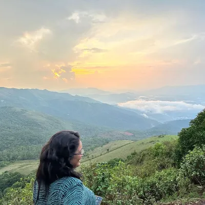 A moment of quiet reflection above the clouds during our Chikmagalur trip. The views from the top of the Western Ghats are truly something else, making every step of the climb worth it.