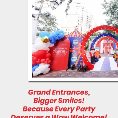 A grand entrance for a carnival-themed party, featuring layered red arches and a custom welcome sign. Every party deserves a wow welcome!