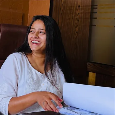 A smile is my strength, and courage is my identity. In my chamber, surrounded by files, I find the energy to give a voice to every silence.