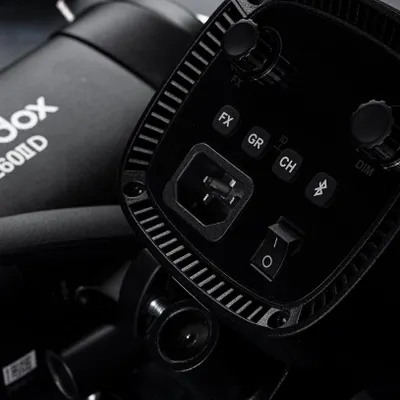 A detailed shot of our Godox studio lights. We invest in professional equipment to deliver consistently high-quality, well-lit images for all our clients.