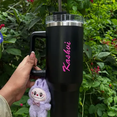 A personalized tumbler with a custom name, a perfect and practical gift for any occasion. I can add any name or message to make it unique.