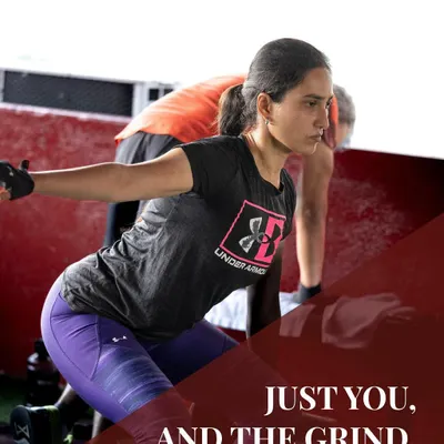 Just you, and the grind. This image captures the intense focus of a client during a dynamic workout, highlighting the dedication required to achieve results.