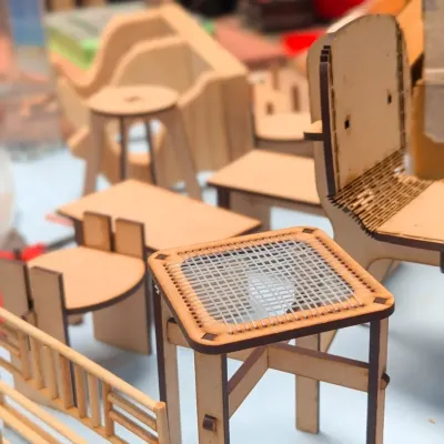 A collection of laser-cut miniature furniture pieces. Our three-hour short format workshop lets you assemble your own scale models and understand the entire design-to-fabrication process.