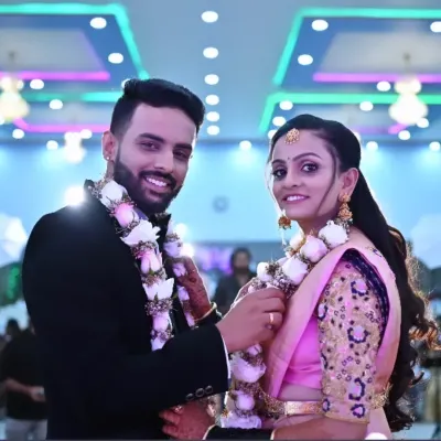 A beautiful, happy moment between the bride and groom during their reception. Her makeup looks flawless and her smile is infectious.