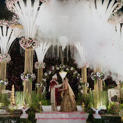 A truly magical varmala moment, complete with a 'walking on clouds' effect. I use special effects like dry ice and cold pyros to elevate key moments, making your wedding ceremony feel like a scene from a fairytale.