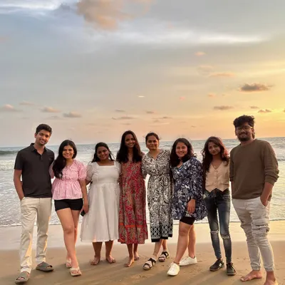 A beautiful sunset on a Gokarna beach with a group of friends. I plan my coastal trips to include these magical moments, perfect for unwinding and taking great photos.