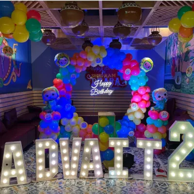 This Cocomelon theme party for Advait's 2nd birthday was so vibrant! I used marquee letters to spell out his name, a colorful balloon arch with character cutouts, and a neon sign.