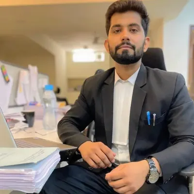 As your advocate, I am committed to providing clear, strategic counsel. This photo captures me at my desk, where I dedicate my time to case preparation and legal research to build the strongest possible case for you.