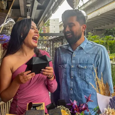 The 'Time Travel' experience is all about reliving your best memories together. Here, a couple enjoys opening a personalized memory box, one of the many elements I include to make the day special.