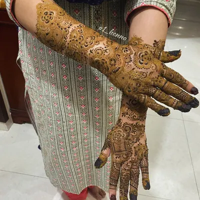 This is the beautiful, dark maroon stain that results from my organic henna. I teach the entire process, from mixing the paste to proper aftercare, to ensure these results.