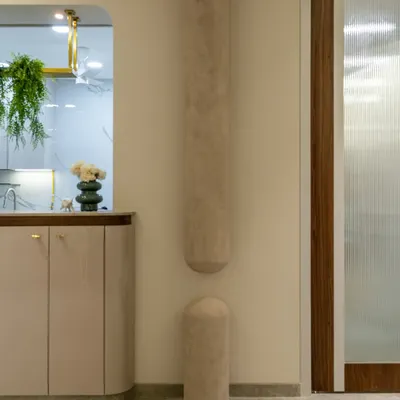 An architectural highlight that redefines lighting. This sculptural column light was meticulously crafted on site, merging form and function into a seamless statement piece. Wrapped in a suede-textured finish, it stands as a quiet yet powerful masterpiece.