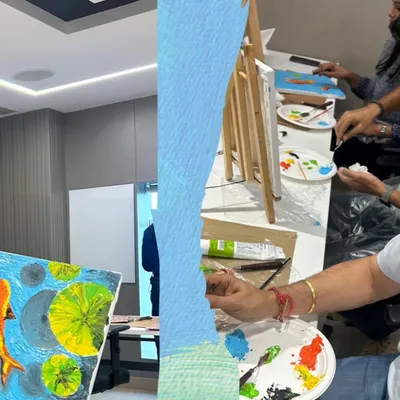 A corporate art session in full swing. My workshops are designed as a perfect employee engagement activity, helping teams bond while creating textured koi fish paintings.