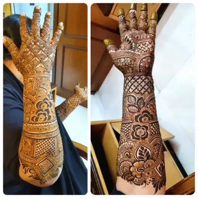 This full-sleeve bridal henna shows how I blend different patterns, from geometric grids to floral motifs, to create a cohesive and stunning design that extends all the way up the arm.