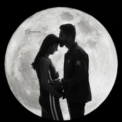 A breathtaking silhouette of a couple against a full moon backdrop. This creative studio concept is perfect for creating dramatic and artistic maternity portraits.
