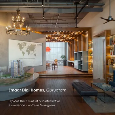 The Emaar Digi Homes Experience Centre in Gurugram, designed as an interactive and welcoming space. The layout combines a model display, lounge seating, and a raised cafe area, guiding visitors through a warm, wood-clad environment.