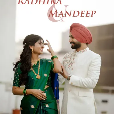 A perfect blend of Maharashtrian elegance and Punjabi charm. Radhika and Mandeep's portrait showcases the beauty of their cross-cultural union.