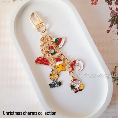 My Christmas charm collection is here. This keychain is loaded with festive charms like Santa, a Christmas tree, a stocking, and more. It's a perfect stocking stuffer.