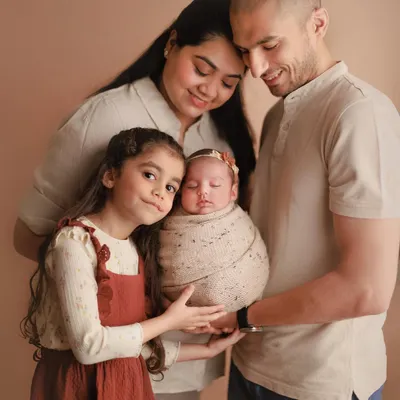 A beautiful family portrait, complete with a proud big sister. Capturing the joy and love of a growing family is one of the most rewarding parts of my job.